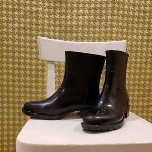 Black rain boots sized 8.5